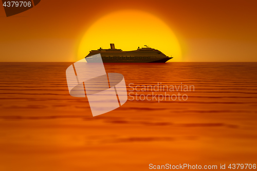 Image of a cruise ship in front of the sunset sky