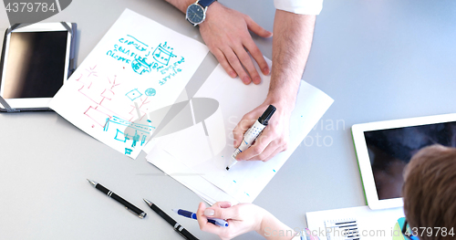 Image of office and teamwork concept - group of business people having a 
