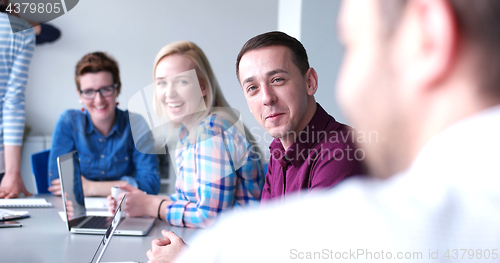 Image of Business Team At A Meeting at modern office building