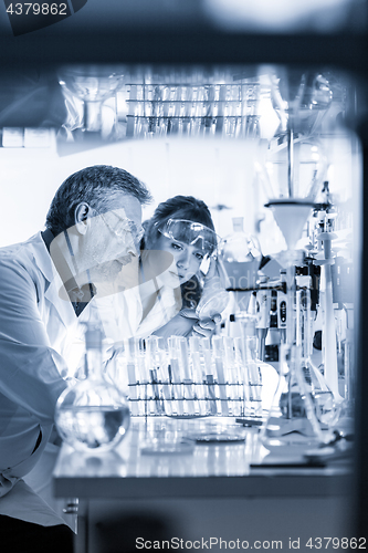 Image of Health care professionals researching in scientific laboratory.