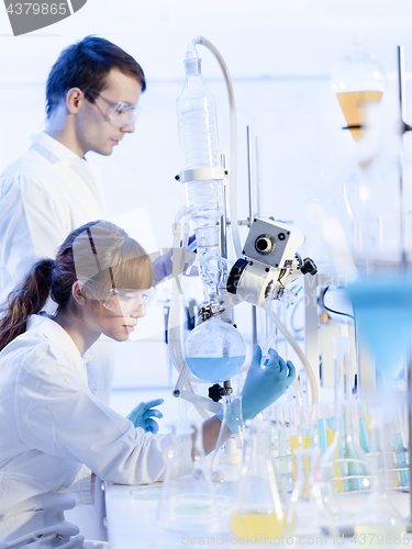 Image of Young chemists researching in life science laboratory.