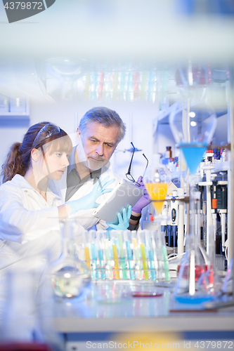 Image of Health care professionals researching in scientific laboratory.