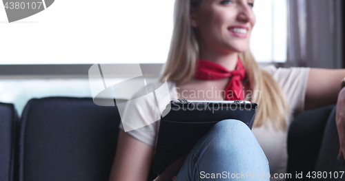 Image of woman using tablet in beautiful apartment