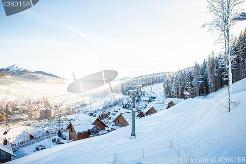 Image of View of beautiful snowy mountains, forests