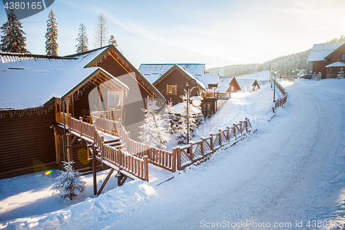 Image of View of beautiful snowy mountains, forests