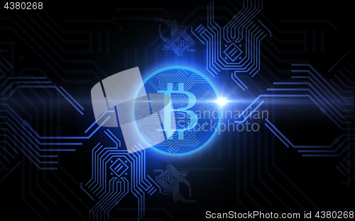 Image of blue bitcoin projection over black background