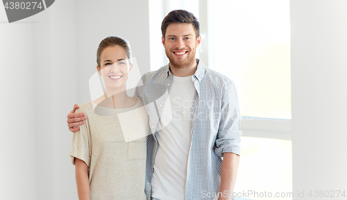 Image of happy couple at new home