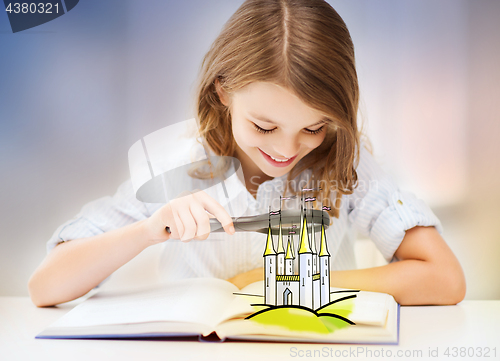 Image of girl with magnifier reading fairytale book
