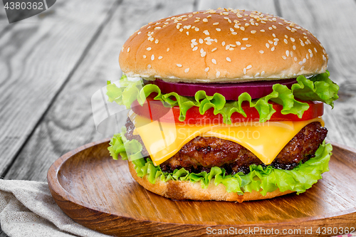 Image of Tasty and appetizing hamburger cheeseburger