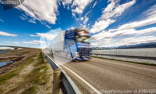 Image of Truck rushes down the highway in the background Atlantic Ocean R