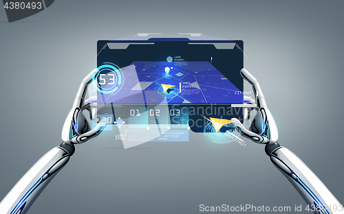 Image of robot hands with gps navigator on tablet pc