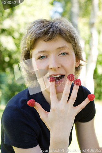 Image of woman with raspberries