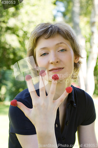 Image of woman with raspberries