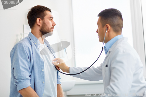Image of doctor with stethoscope and patient at hospital