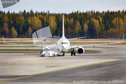 Image of Airliner at an airport taxiway