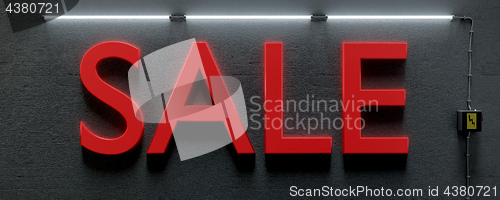 Image of a underground wall with neon lights and word sale