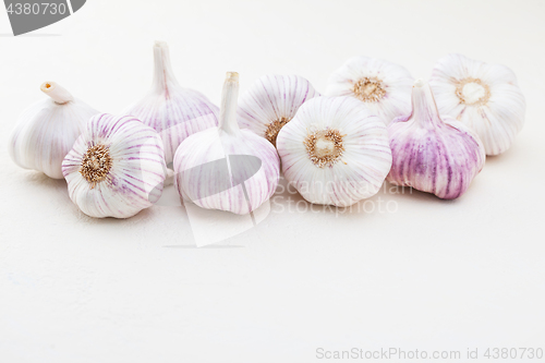 Image of garlic bulbs on white background