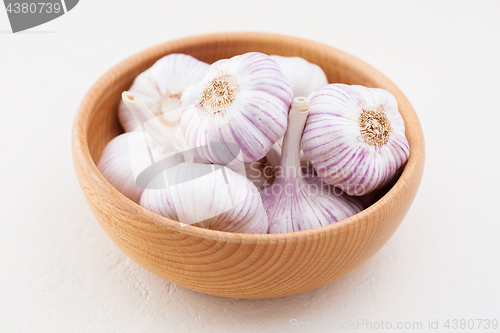 Image of garlic bulbs on white background