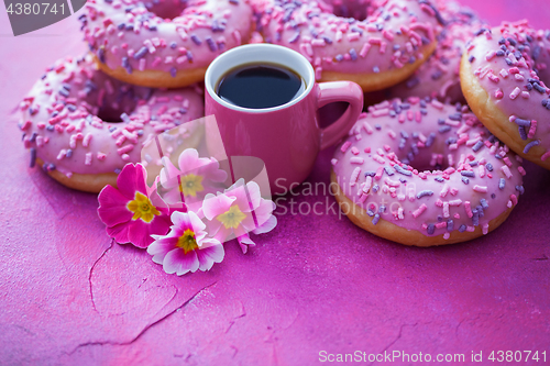 Image of delicious pink donuts