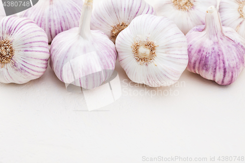 Image of garlic bulbs on white background