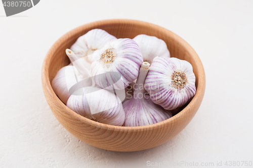 Image of garlic bulbs on white background