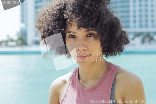 Image of Pretty ethnic woman in sunshine