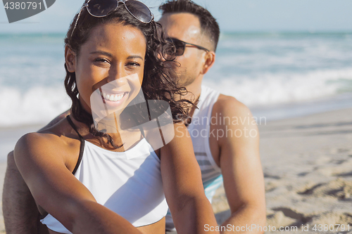 Image of Pretty black girl with boyfriend on beach