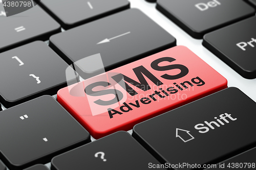 Image of Marketing concept: SMS Advertising on computer keyboard background