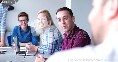 Image of Business Team At A Meeting at modern office building