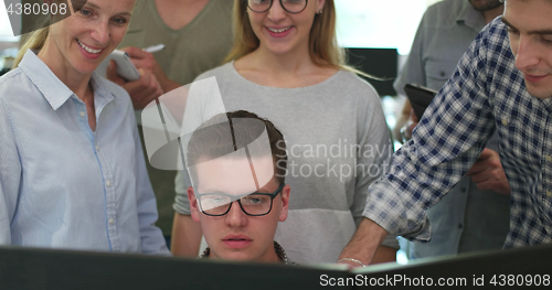 Image of Business Team At A Meeting at modern office building