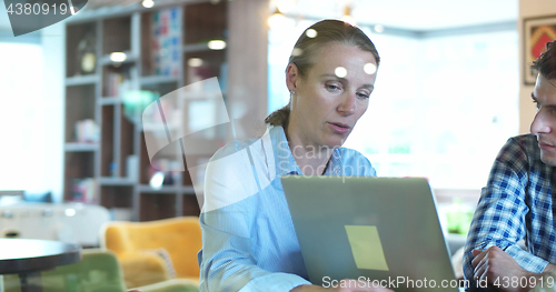 Image of Business Team At A Meeting at modern office building