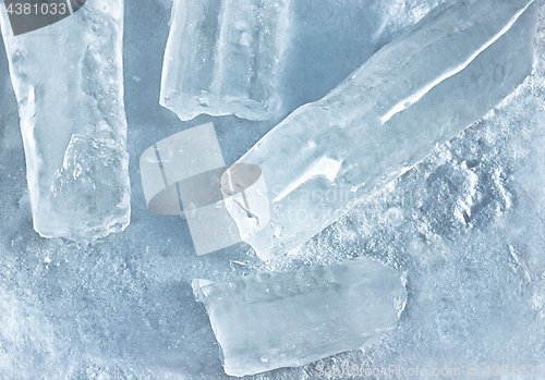 Image of Refreshing Natural Background Of Icicles On Snow