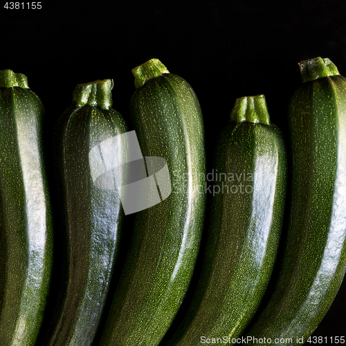 Image of Zucchini (zucchetti, courgettes) on a black background