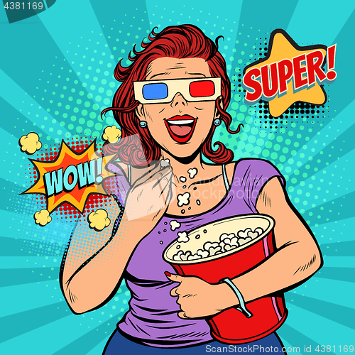 Image of woman in 3D glasses watching a movie, smiling and eating popcorn