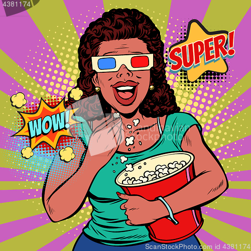 Image of woman in 3D glasses watching a movie, smiling and eating popcorn