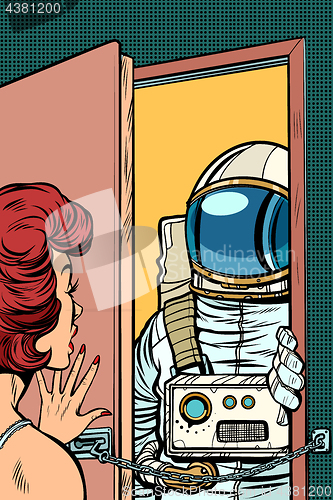 Image of Astronaut came to visit a woman, the door was opened