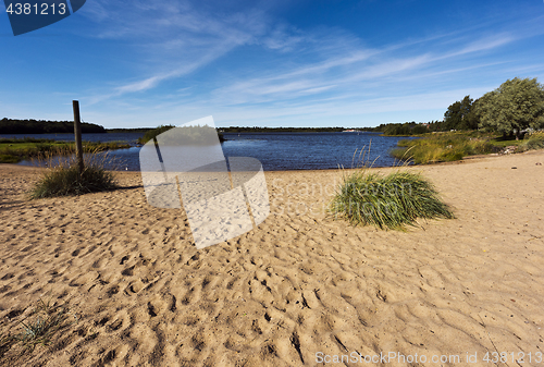 Image of Sandy shore and water in late summer. Finland