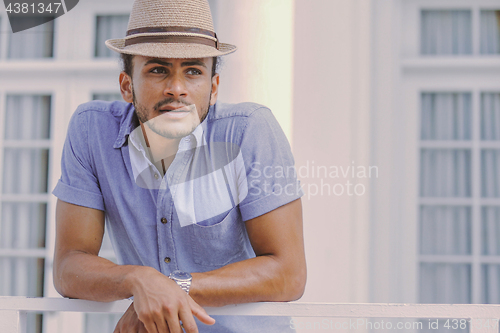 Image of Handsome man at handrail