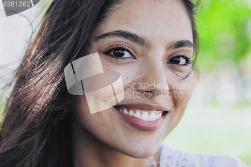 Image of Close-up of charming smiling model