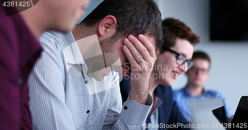 Image of Business Team At A Meeting at modern office building