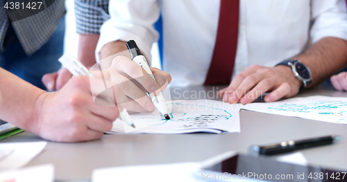 Image of office and teamwork concept - group of business people having a 