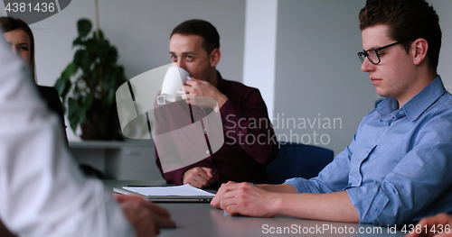 Image of Business Team At A Meeting at modern office building