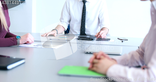 Image of office and teamwork concept - group of business people having a 