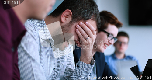 Image of Business Team At A Meeting at modern office building