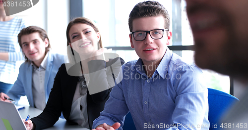 Image of Business Team At A Meeting at modern office building
