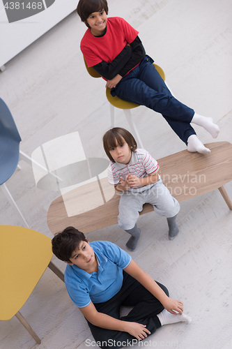 Image of boys in a new modern home