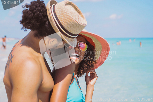 Image of Happy laughing romantic couple at seaside