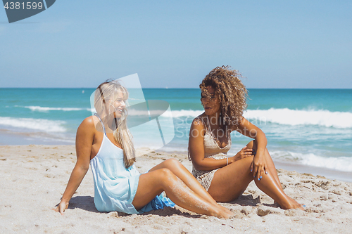 Image of Content women enjoying tropical beach