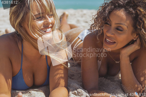 Image of Laughing women on tropical coast