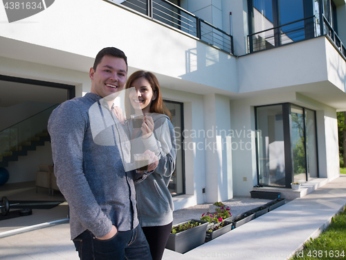 Image of couple enjoying morning coffee